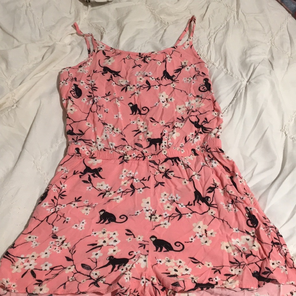 Pink monkey romper.